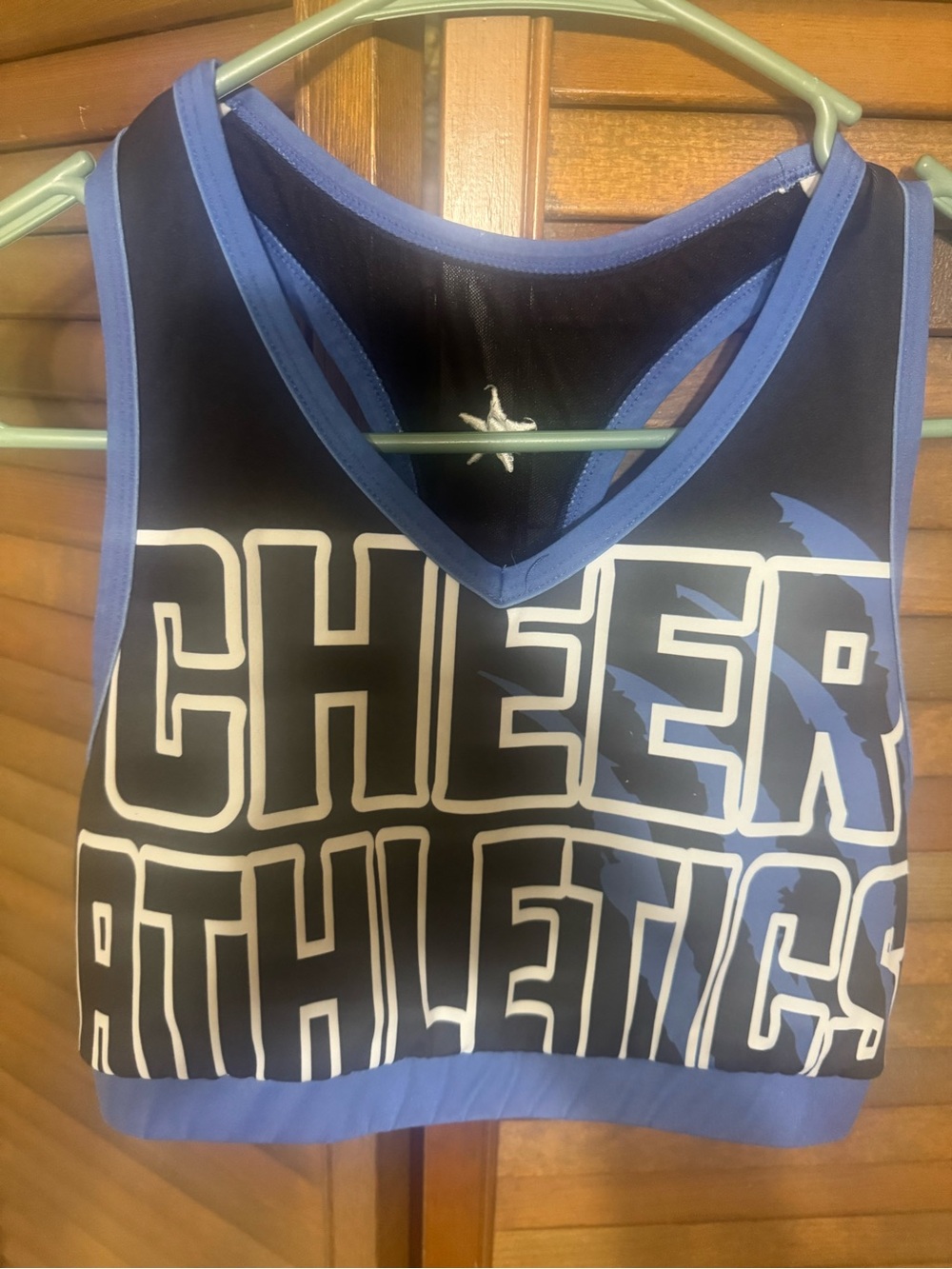 Cheer athletics blue and white sports bra adult medium rebel cheer